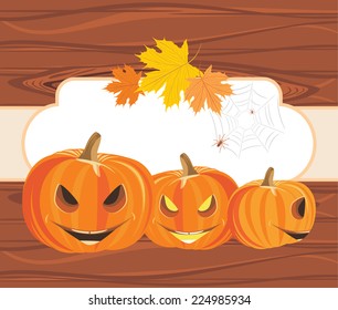 Halloween pumpkins and spiders on the wooden background with frame. Vector