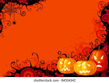 Halloween pumpkins. Three glowing halloween pumpkins and spider with web on  abstract background.