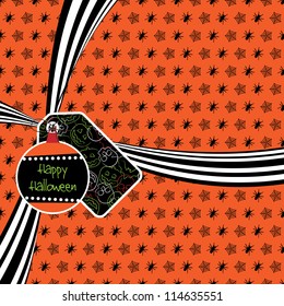halloween ribbon on spider wrapping with gift tags