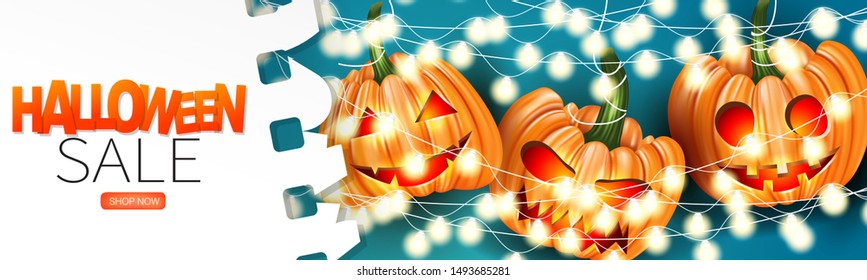 Halloween sale banner, header, or card with creepy pumpkin faces and glowing lights garland on blue background covered by a white shhet of torn out paper. Vector illustration.