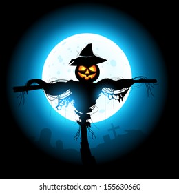 A halloween Scarecrow silhouetted by the moon.