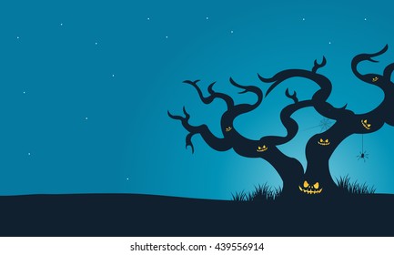 Halloween scary dry tree silhouette with blue backgrounds