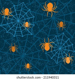 Halloween seamless background with spiders and web