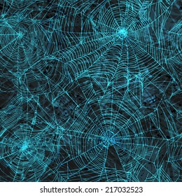 Halloween seamless - blue web on a dark background