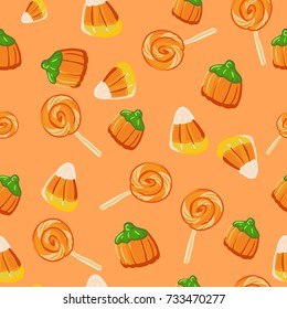 Halloween seamless pattern background with candy pumpkin vector