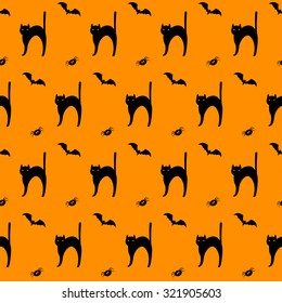 Halloween seamless pattern background with cats, bats and spiders