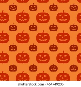 Halloween seamless pattern. Background with silhouettes of pumpkins.