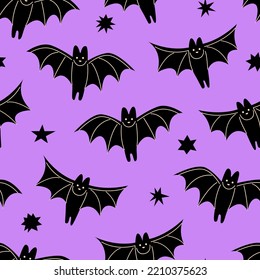 Halloween seamless pattern with black bats and stars. Cute vector purple background. 