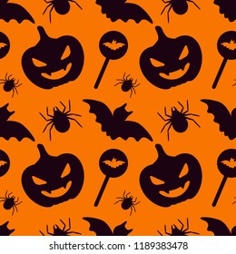 Halloween seamless pattern. Black elements on orange / pumpkin background