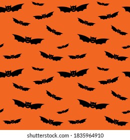 Patrón ininterrumpido de Halloween con murciélagos voladores negros. Silhouettes de murciélago sobre el fondo naranja para envolver papel, postales, textil doméstico, disfraces. Ilustración vectorial aislada. Decoración de Halloween