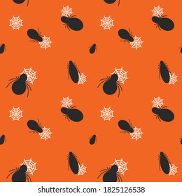 Halloween seamless pattern with black spiders and white spider webs on orange background