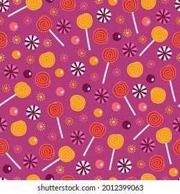 Patrón ininterrumpido de Halloween con caramelos y copas sobre fondo morado. Perfecto para vacaciones de otoño, papel pintado, papel envuelto, tela. Ilustración del vector