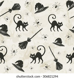 Halloween seamless pattern with cats, brooms and witch hats. 