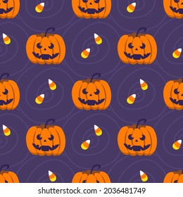 Halloween seamless pattern. Cute pumpkins and sweets. Vector illustration