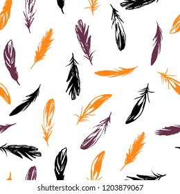 Halloween  seamless pattern with feathers on a white background.