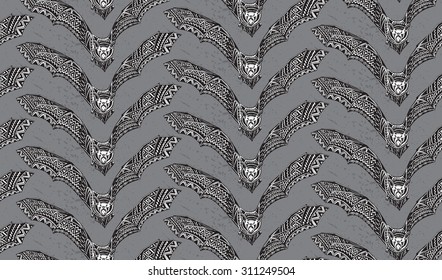 Halloween seamless pattern with hand drawn graphic ornate bats 