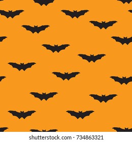 Halloween seamless pattern. Holiday background with flying bat