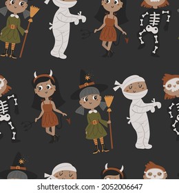 Halloween seamless pattern with kids in costumes. Pattern for scrapbooking, wallpaper, children's and children's clothing.