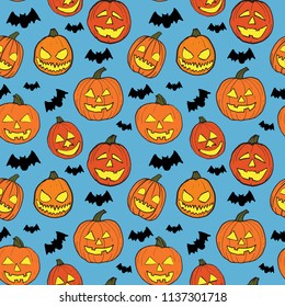 Halloween seamless pattern with orange pumpkins carved faces and black bats on blue background. It can be used in design, for cards, wallpapers, textile print, scrapbook digital paper, page fill. Hand