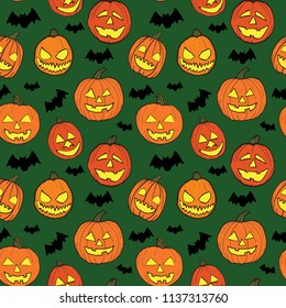 Halloween seamless pattern with orange pumpkins carved faces and black bats on green background. It can be used in design, for cards, wallpapers, textile print, scrapbook digital paper, page fill. 