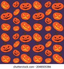 Halloween seamless pattern with pumpkins on a purple background. Scary carved glowing lanterns. Vector texture for party decoration.