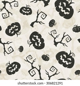 Halloween seamless pattern with pumpkins and tree brunches.