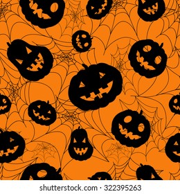 Halloween seamless pattern with pumpkins and web