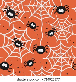 Halloween seamless pattern with spiders and web.