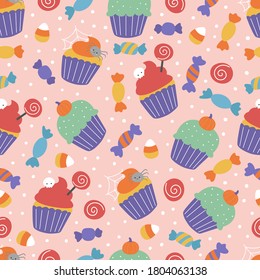 Halloween seamless pattern with sweets. Spooky cupcakes and candies on pink background. Vector cartoon food. Ideal for print on fabric, paper and wallpaper.