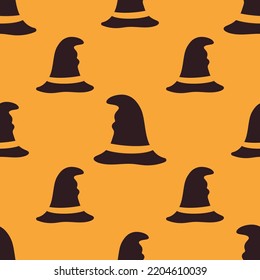 halloween seamless pattern with witch hat on orange, vector background with scary holiday horror sketch, magic print for halloween, flat design