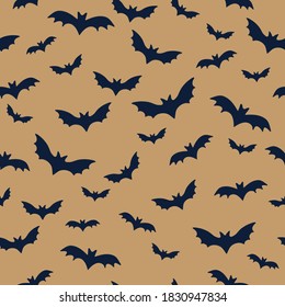 Halloween seamless vector pattern with bats on a gold background. For wallpaper, wrapping paper, textiles, postcards, web page backgrounds, interior decor. Cartoon design.