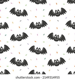 Halloween seamless vector pattern with cute hand drawn bat and confetti. Kawaii animal background for kids room decor, nursery art, card, gift, fabric, textile, wrapping paper, wallpaper, packaging.