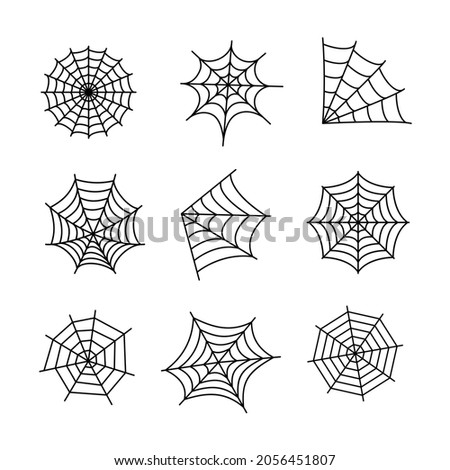 Halloween set of black spider web isolated on white background. Vector design elements.