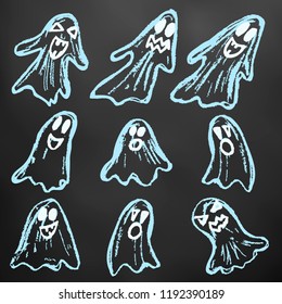 Halloween. Set of ghosts. Color chalk on a blackboard. A collection of funny faces. Autumn holidays. Fun, children, traditions