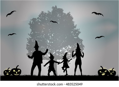 Halloween - silhouette of a family.