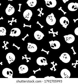 Halloween Skulls and bones seamless pattern. Childish vector illustration of funny dead faces in cartoon hand-drawn style on black background. Ideal for fabric printing, packaging.