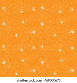 Halloween spider web seamless pattern. Vector background. Orange and black.