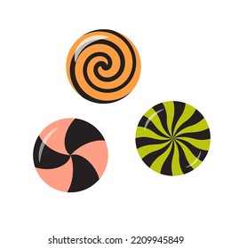 Halloween swirl sweet candies, round lollipops, bonbons.