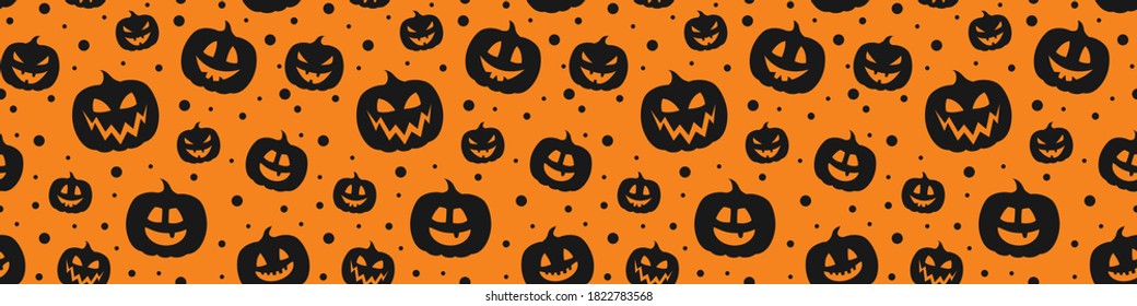 Halloween texture with craved pumpkins. Wrapping paper. Vector