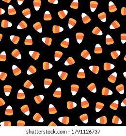 Halloween trick or treat candies seamless pattern. Vector illustration of candy in a simple hand-drawn style. The limited palette is ideal for fabric printing, packaging