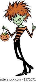 Halloween vampire boy holding sweets