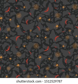 Halloween vector background with spiders, bats, butterflies and spiderwebs in black, red, orange and grey on black background. Seamless pattern for fabric, textile, gifts, wallpaper and scrapbooking.