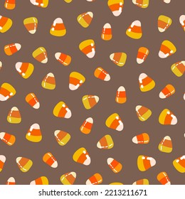 Halloween vector illustration. Pattern with  candy corn. Dark background, wallpaper, flat art, cartoon style
