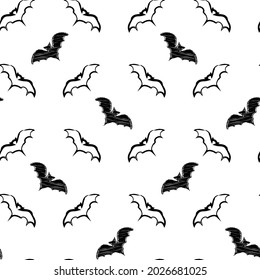 Halloween vector seamless background. Repeating pattern with hand drawn black flying bats on white background. Ready for printing on textile, fabric, bedding and other seamless surfaces. 