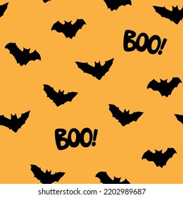 Halloween vector seamless pattern with flying bats 