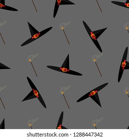 Halloween vector seamless pattern with witch hats and magic wand on gray background