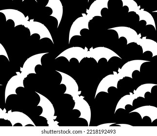 Halloween vector seamless texture with flying bats 
