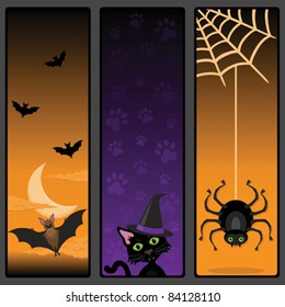 Halloween Vertical Banners each individually grouped. With a bat flying in a moon lit sky, a black cat wearing a witches hat and a spider dangling from a web.