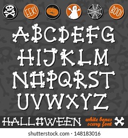 halloween white bones scary font latin alphabet and halloween related buttons on dark background education set 