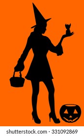 Halloween Witch. Beautiful young woman in witches hat and costume holding magical angel in her hand